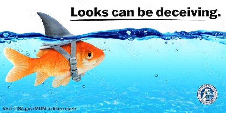Photo manipulation of a goldfish underwater with it's top fin becoming a shark fin above water. Text reads "Looks can be deceiving. Visit CISA.gov/MDM to learn more"